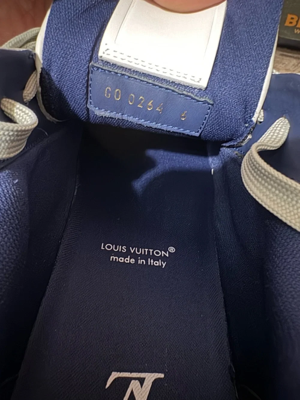Louis Vuitton Men’s White and Navy Trainer Sneakers with Gray Accents - Picture 9 of 10